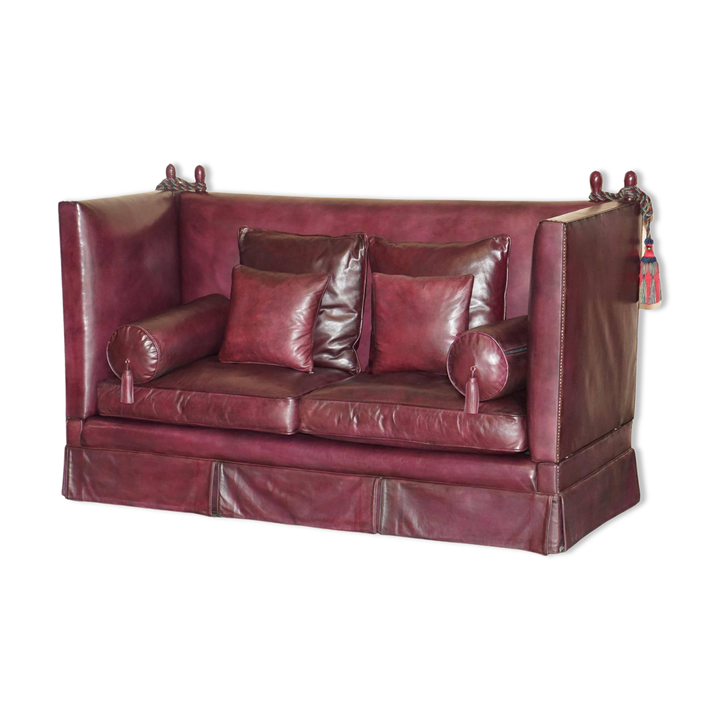 Victorian Knole canapé restored in leather with feather cushions.