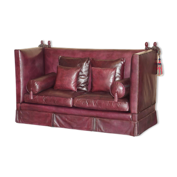 Victorian Knole canapé restored in leather with feather cushions.