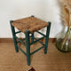 Vintage stool in green patinated wood and straw
