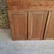 Oak workshop furniture with sliding doors.