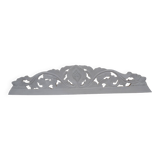 Decorative pediment in white carved wood