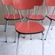 Suite de 4 chaises en formica rouge