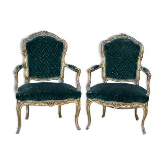 Paire de fauteuils dorés