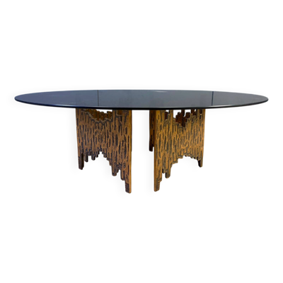 Table basse en bronze de style 'Paul Evans' avec plateau en verre fumé rond.