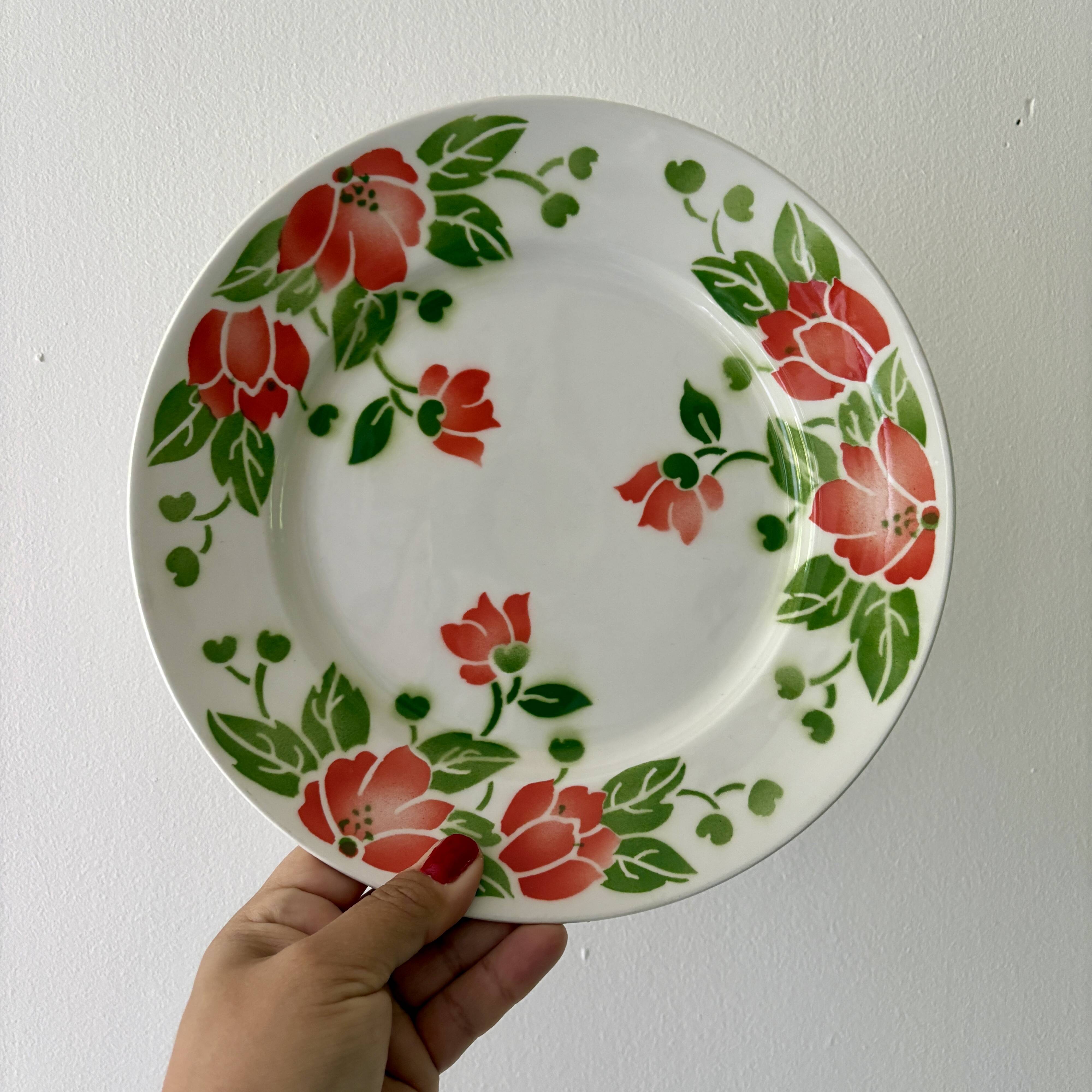 Set of 11 vintage flat plates by Eric de Moulin des Loups.