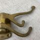 Three-pronged folding brass coat hook