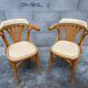 Pair of vintage curved wood restaurant armchairs
