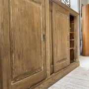 Large row of solid oak loom sliding doors