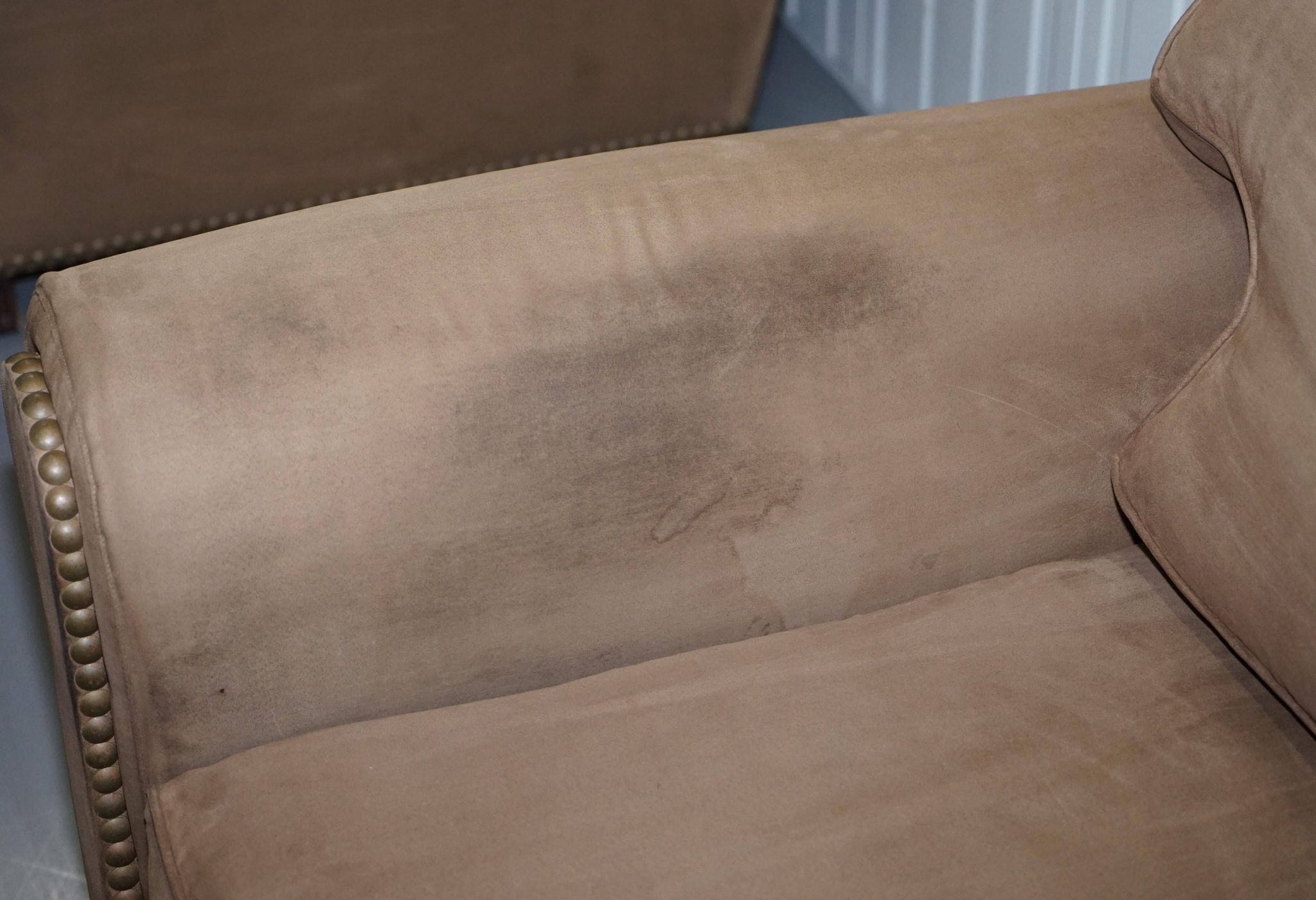 Ralph Lauren Jamaica velvet sofa pair with feather cushions.