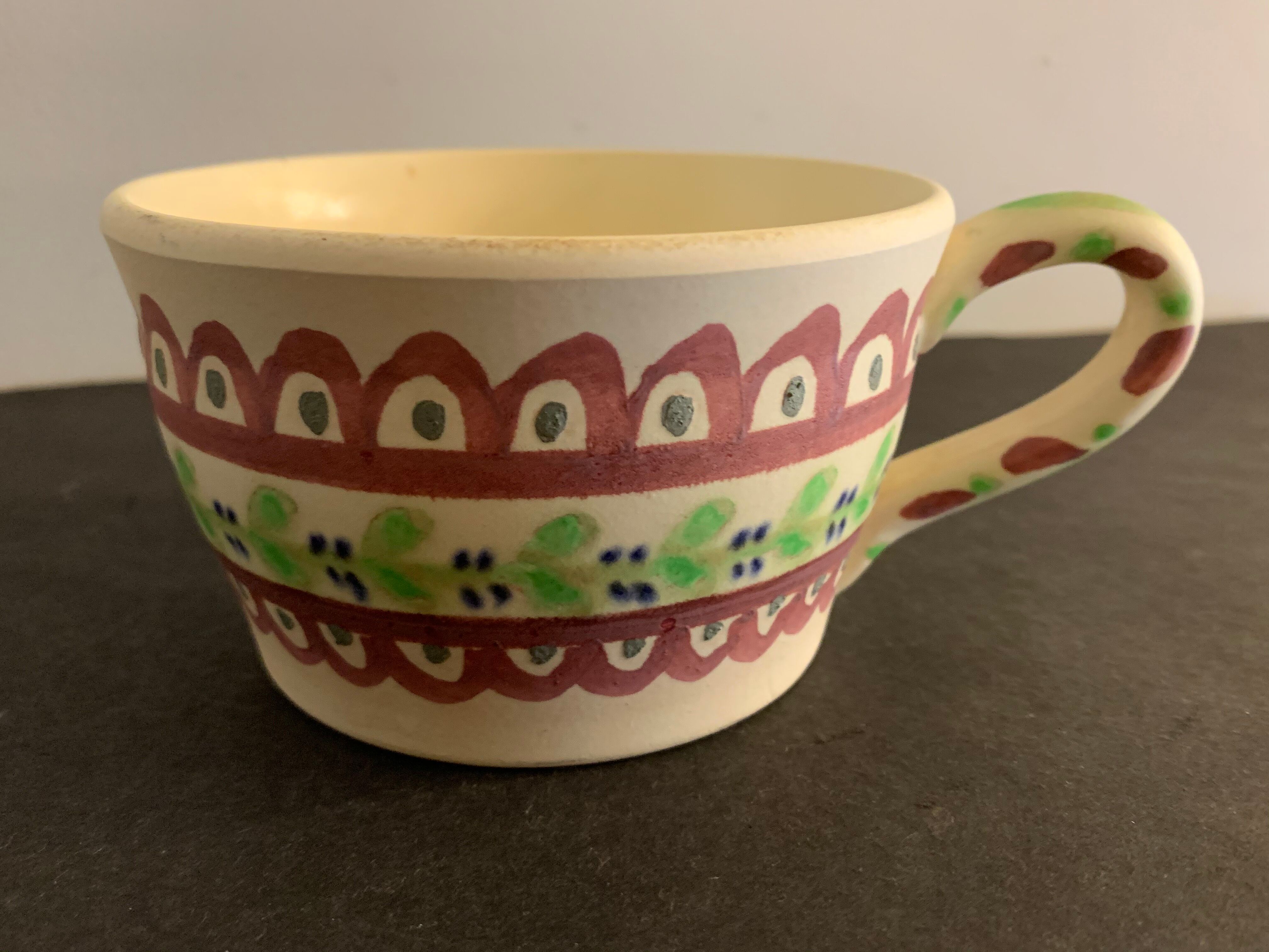 Pair of ceramic cups including a mustache cup for gentleman