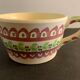 Pair of ceramic cups including a mustache cup for gentleman