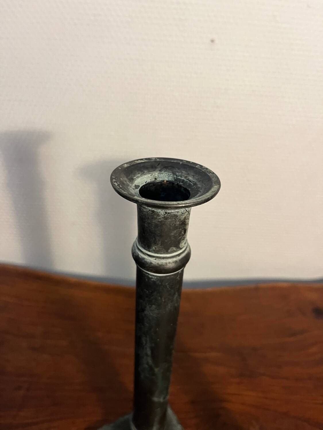 Pair of removable patinated brass candlesticks