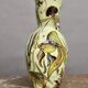 Ceramic jug with fish decoration