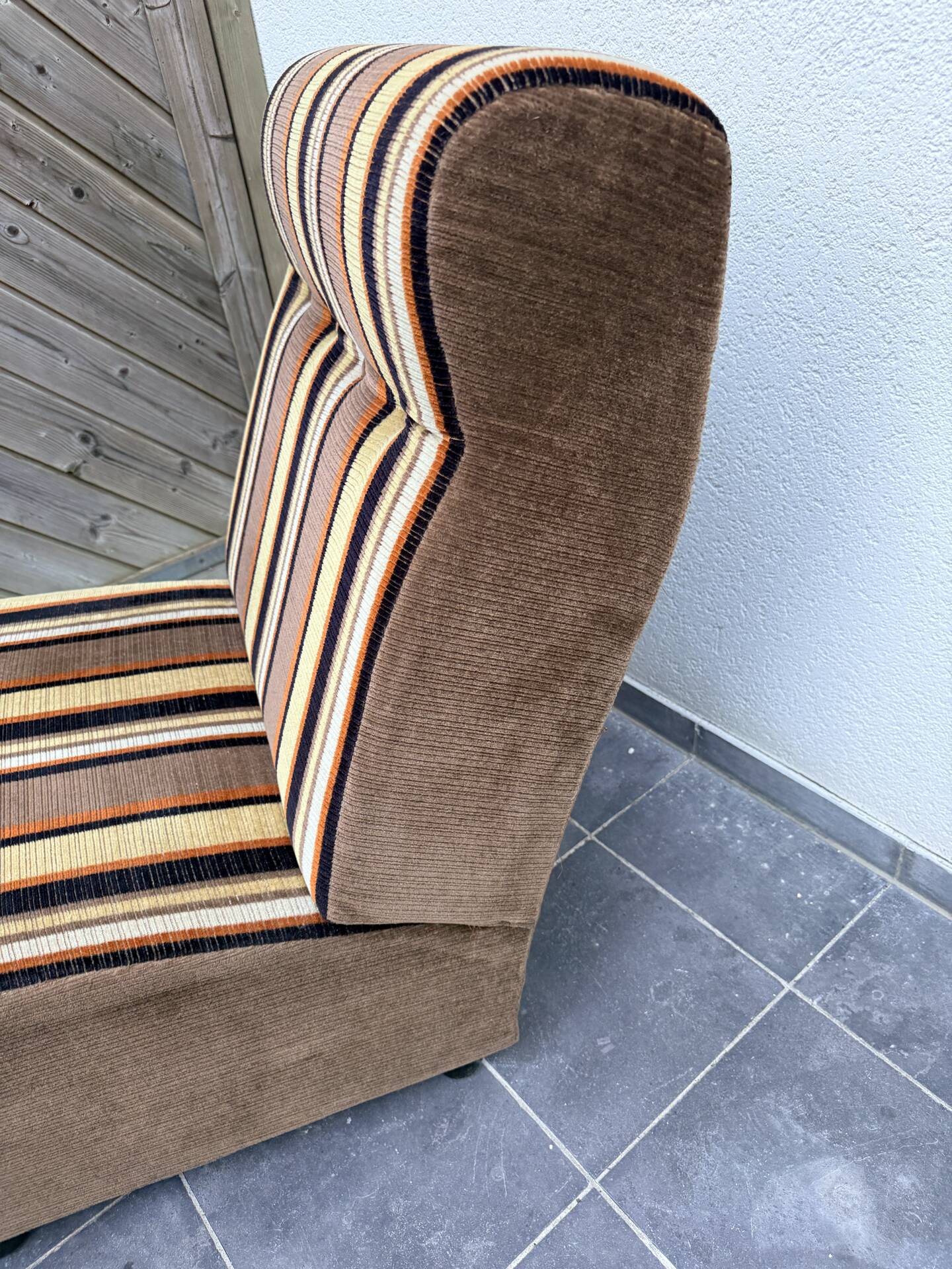 Vintage 1970s lounge chair – striped orange, brown, and cream velvet