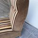 Vintage 1970s lounge chair – striped orange, brown, and cream velvet