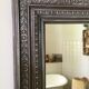 Antique patinated wood mirror