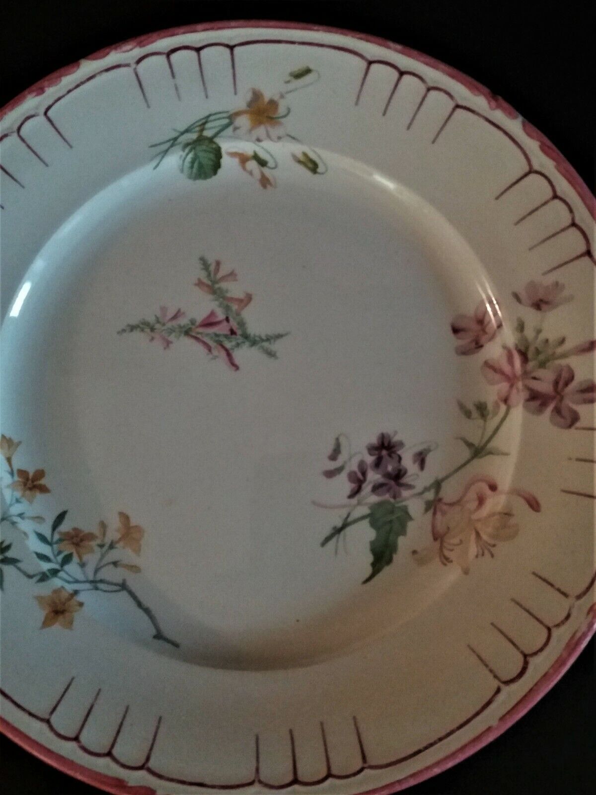 Flat earthenware plate by Choisy le Roi for Au vase étrusque Paris