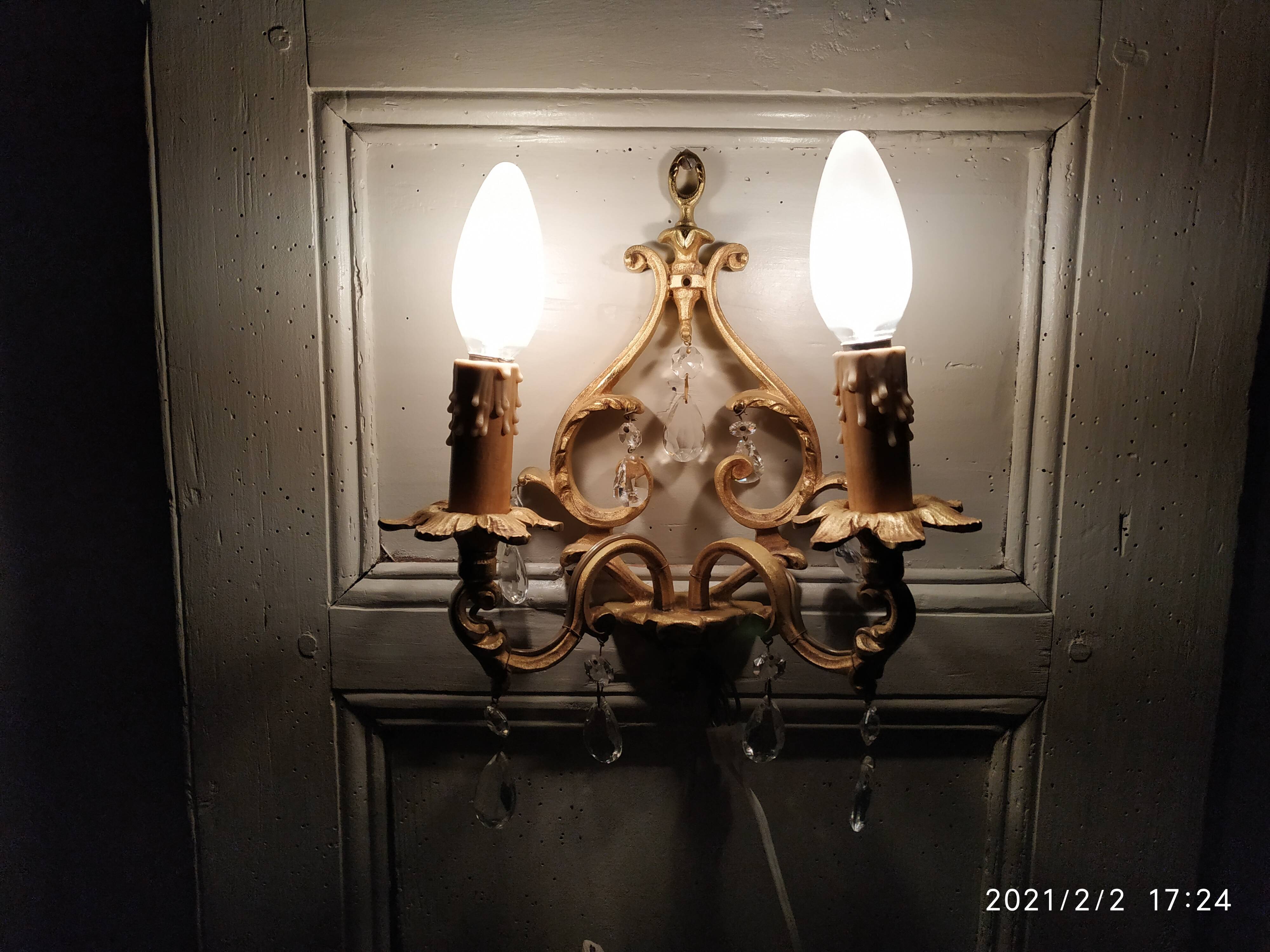 Bronze and stamps sconce