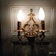 Bronze and stamps sconce