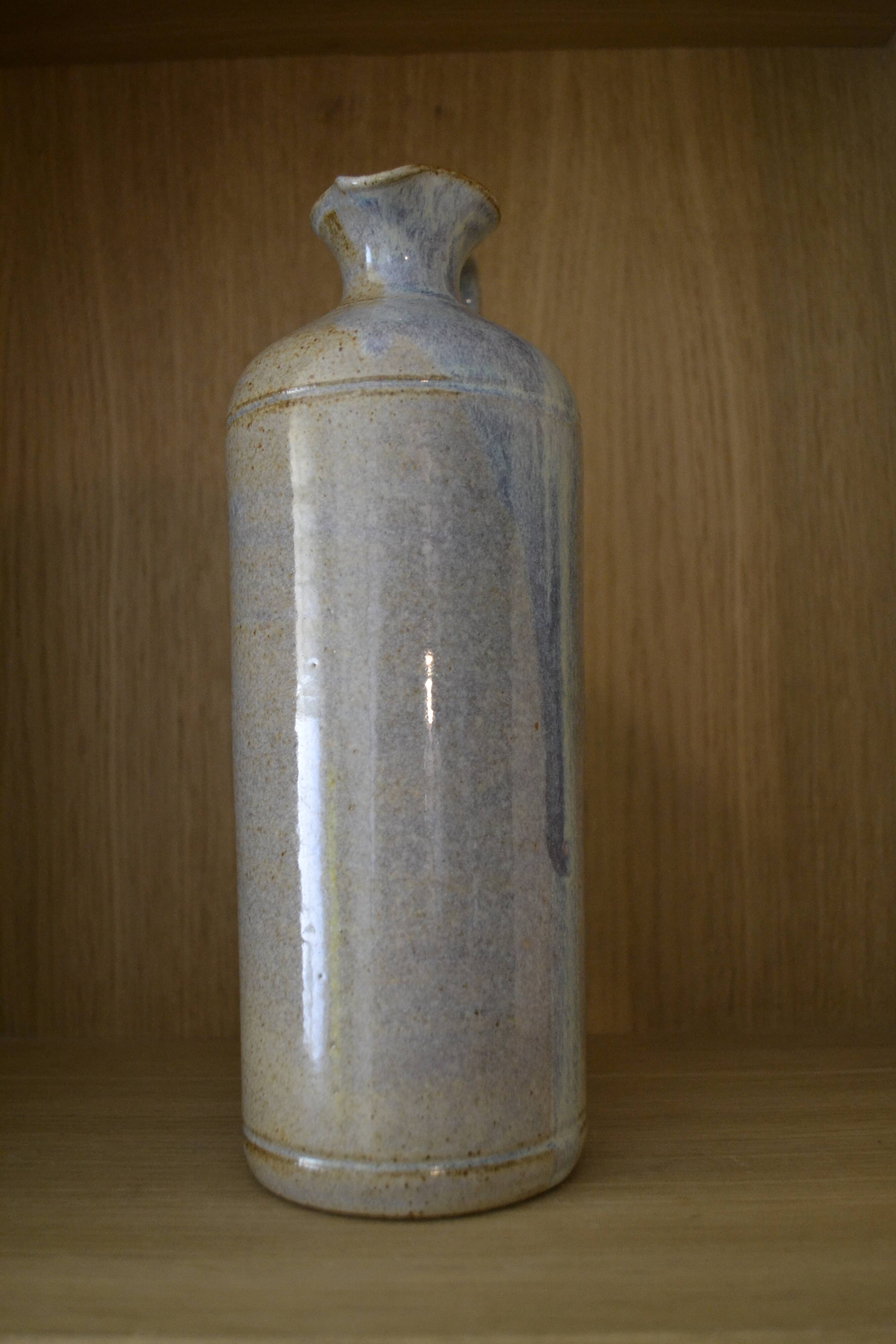 Light blue sandstone bottle