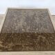 1970s coffee table covered in fabric with glass top