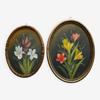 Set of 2 small oval paintings, flowers