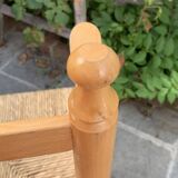 Old wooden and straw high chair for children