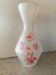 Kitsch vase with floral decoration
