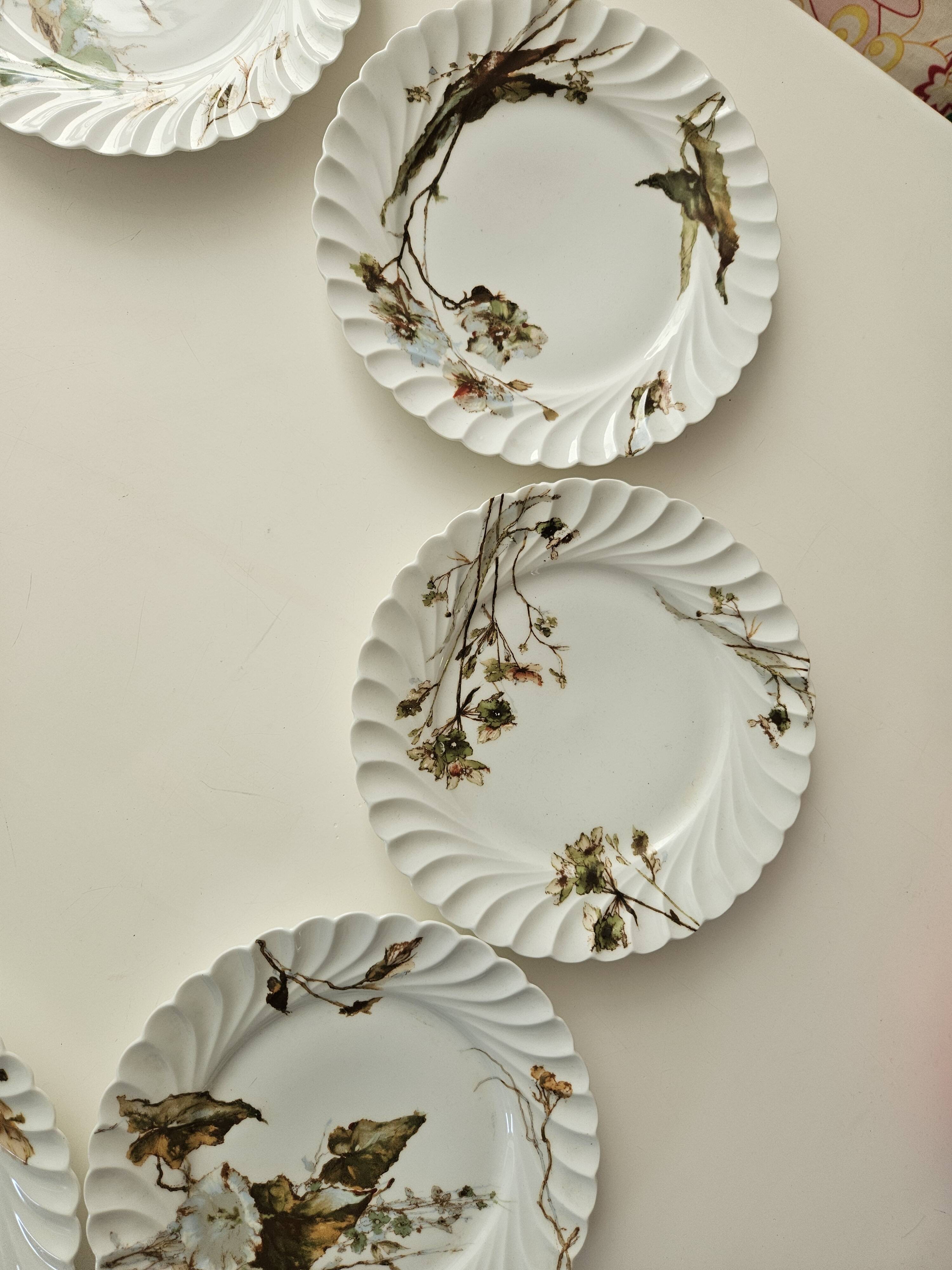 Haviland service plates, dishes on pedestals and soup tureen