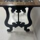 Blackened wood display table with marquetry top, Spain, 19th century.