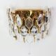 Pair of wall sconces in gilded brass and crystal by Palwa, Germany, 1970s.
