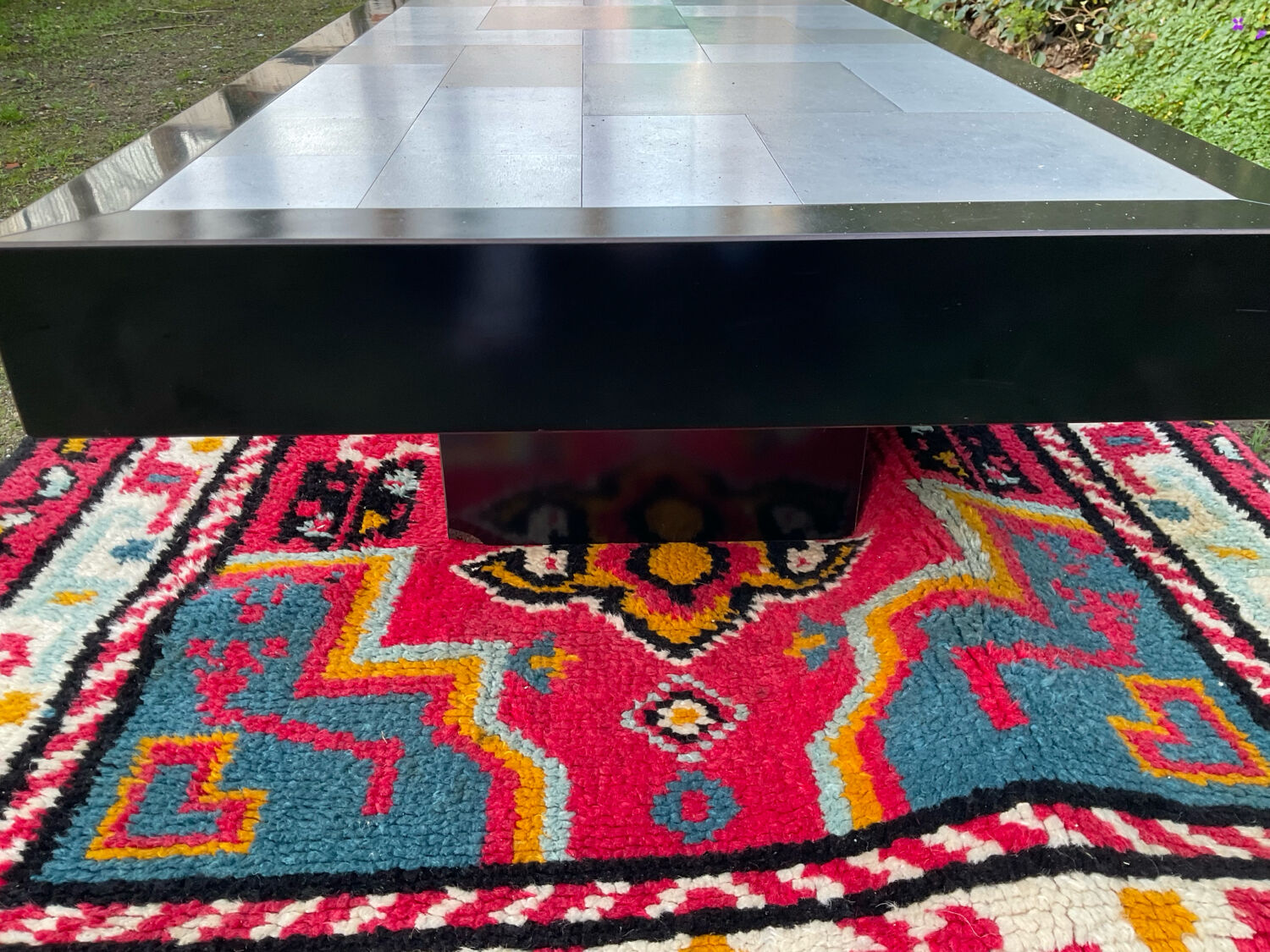 Vintage coffee table in stainless steel and black lacquered wood.