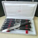 Coffret de 12 couteaux de table inox et bois noirci