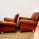 Pair of armchairs with club leather mustache