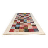 Vintage Gabbeh runner rug with geometric patterns and animals.