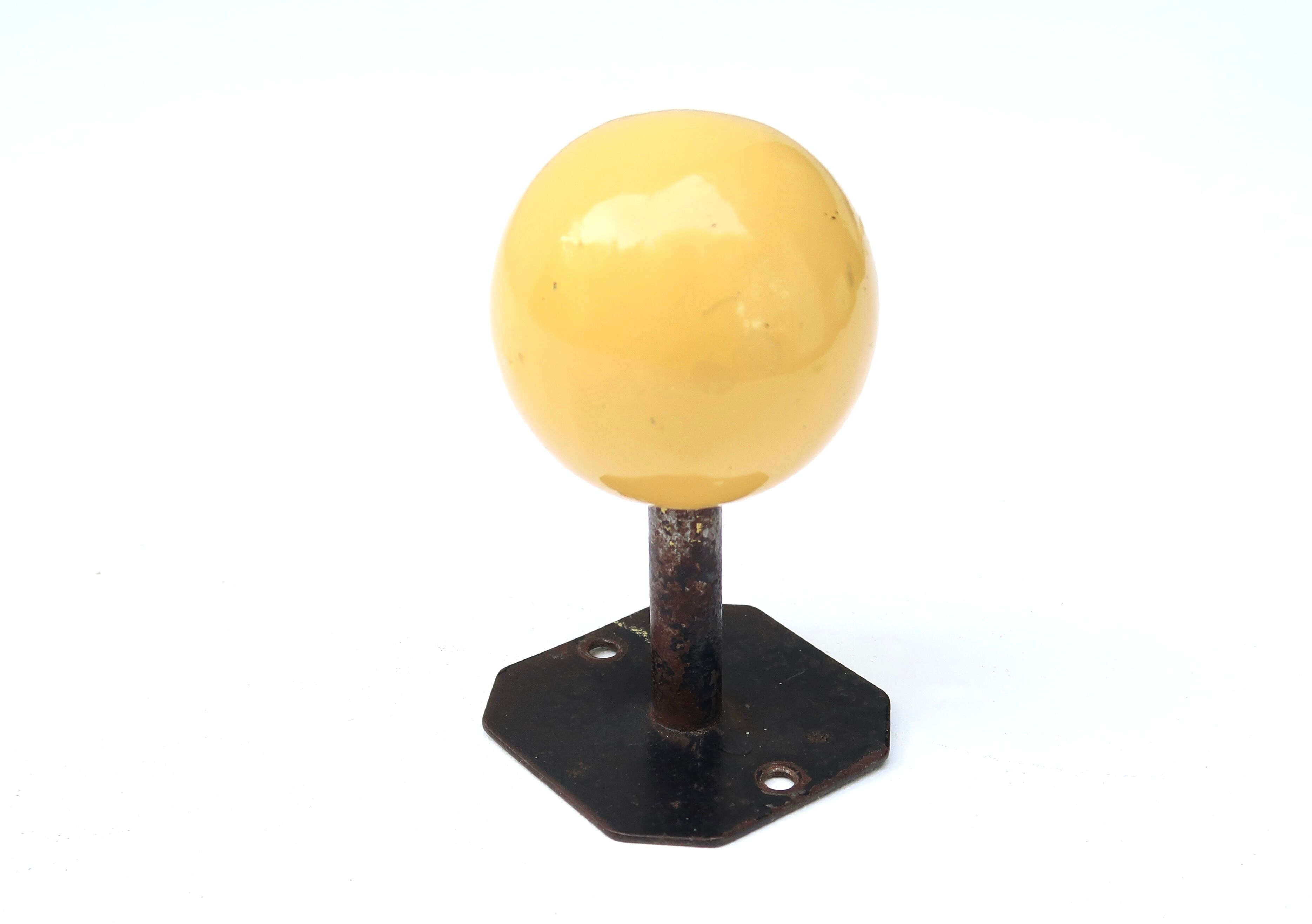 Metal hook, yellow wood ball, 50s
