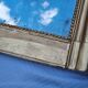 Large gilded Louis-Philippe antique mirror from the 19th century with original glass, measuring 129 x 10 cm.