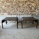 Pair of large riveted metal industrial tables