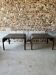 Pair of large riveted metal industrial tables