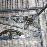 Wrought iron vest and a shelf with a hat