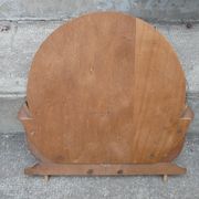 Round mirror on 60's furniture