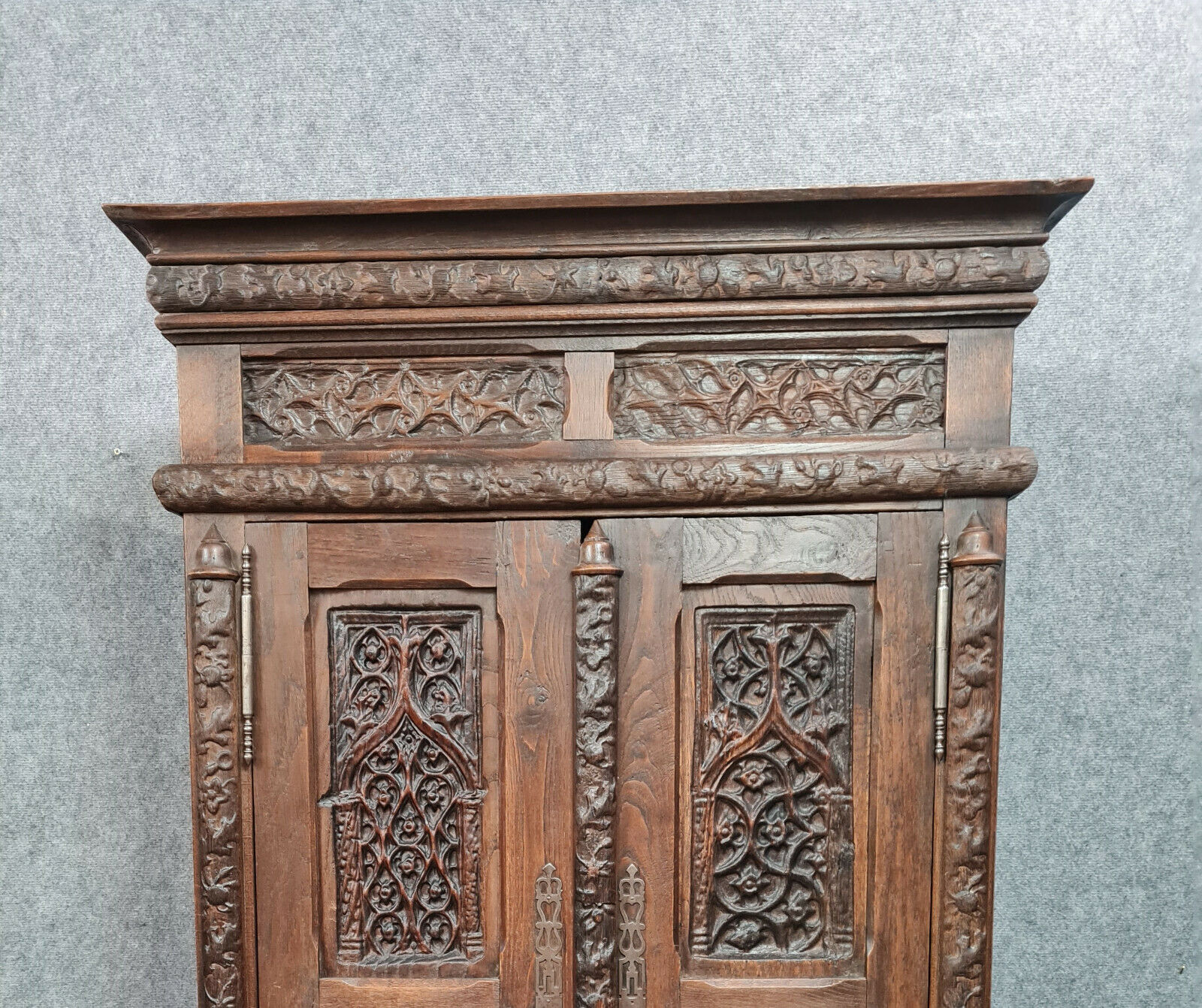Gothic Renaissance style cabinet with solid oak putto around 1850