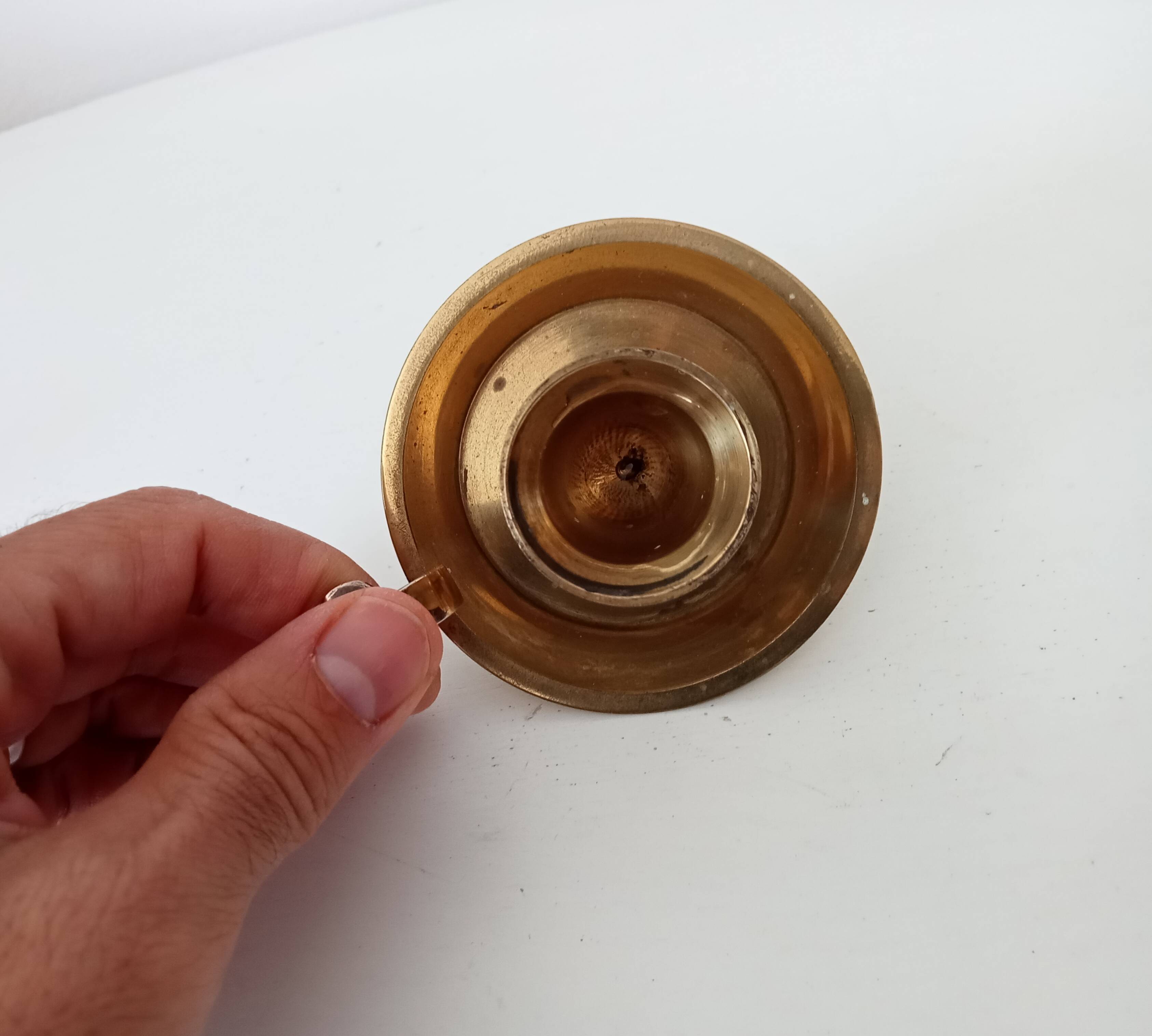 Vintage hand candle holder in solid golden brass