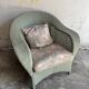 Vintage wicker lounge chair with pastel cushions – 1980s