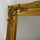Miroir biseauté style empire doré 64x54cm