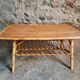 Vintage bamboo and rattan coffee table with magazine rack, French, circa 1960–1970.