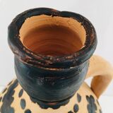 Raw and black terracotta jug