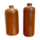 Set of two bottles or jugs in ocher-brown enamelled sandstone