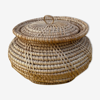 Vintage basket in braided rattan
