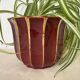 Antique burgundy and gold ceramic flowerpot